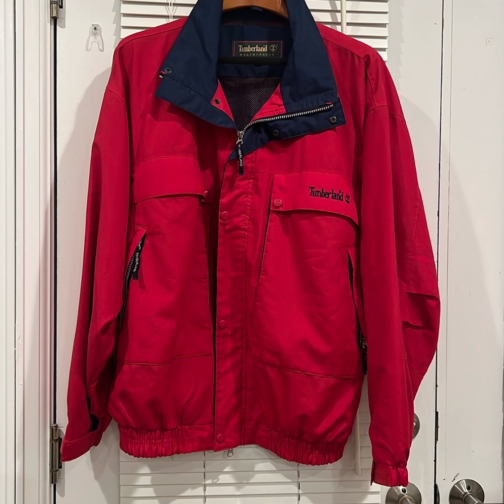 Mint condition vintage Timberland jacket. Red and navy blue color.
